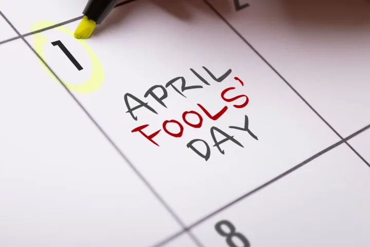A calendar showing April 1st highlighted with a yellow marker and 'April Fools' Day' written in bold lettering.