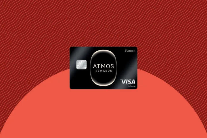 Atmos Rewards Summit Visa credit card displayed on a red gradient background.